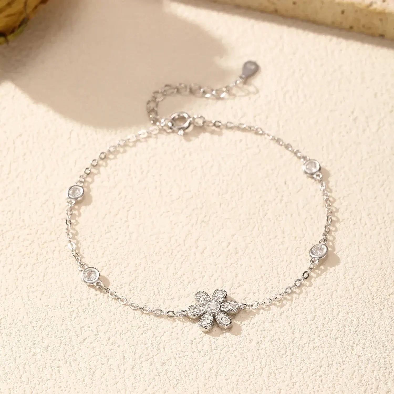Plant Chain Bracelet 925 Sterling Silver featuring a sparkling flower design and adjustable length for comfort.