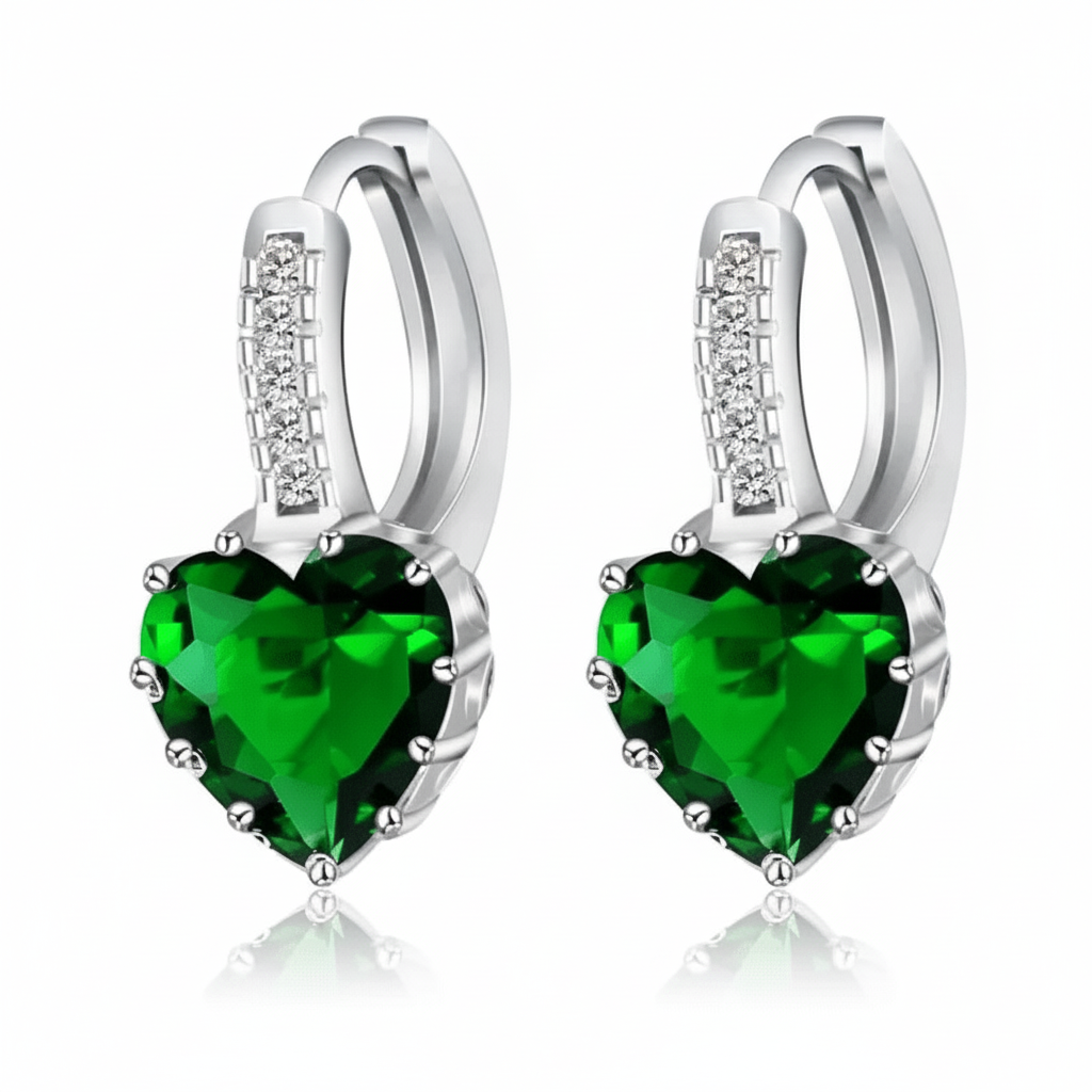 Heart-shaped green crystal earrings in sterling silver, trendy design perfect for parties and special occasions.