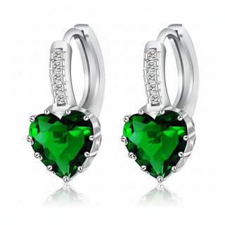 Heart-shaped green crystal earrings in sterling silver, trendy design perfect for parties and special occasions.
