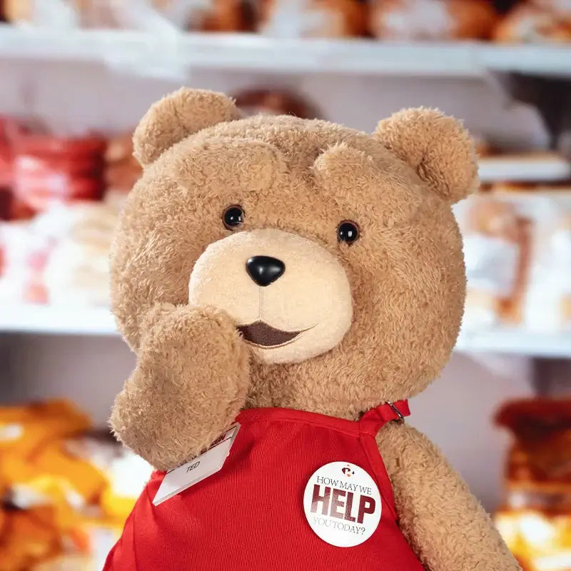 Ted 2 POP MART plush bear model in brown color wearing a red outfit, perfect for collectors and fans.