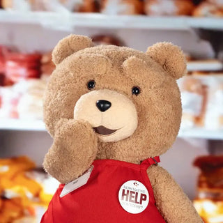 Ted 2 POP MART plush bear model in brown color wearing a red outfit, perfect for collectors and fans.