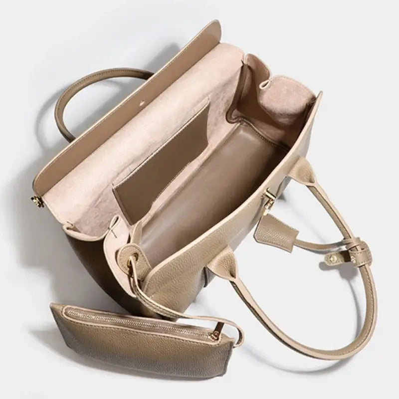 Taupe leather women's tote bag interior with matching pouch, microfiber synthetic leather, stylish and spacious design.