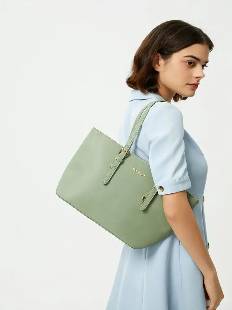 Tote Bag with Adjustable Shoulder Straps in light green color, worn by a model showcasing its stylish design.