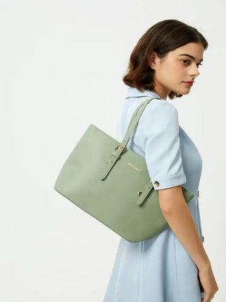 Tote Bag with Adjustable Shoulder Straps in light green color, worn by a model showcasing its stylish design.