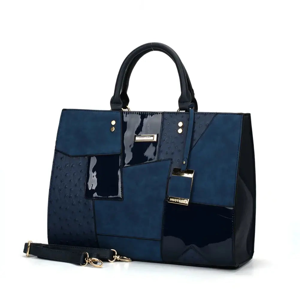 Navy geometric-pattern tote handbag with durable PU leather, stylish structure, and secure zipper closure.