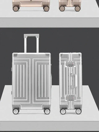 Travel suitcase aluminum carry-on luggage with spinner wheels, stylish design in silver color, 65 cm height.
