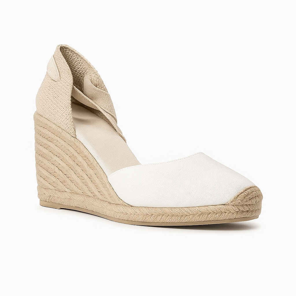 White espadrille sandals with ankle strap, stylish lace-up design, perfect for warm weather wear.