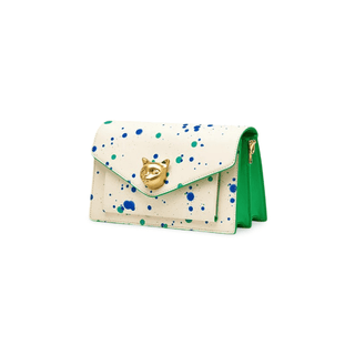 White crossbody bag with paint splatter design and gold fox emblem, crafted from cowhide leather.