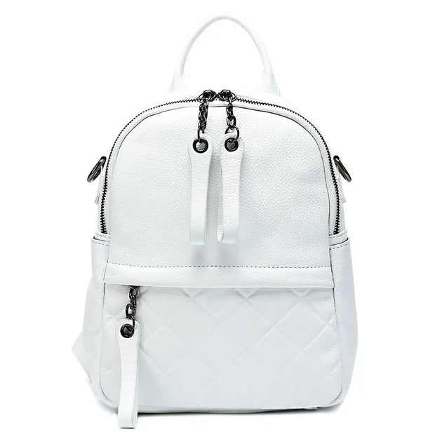 White leather backpack, stylish and functional, with embossed texture and soft cotton lining.