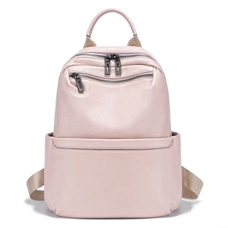 Pink leather backpack for women, lightweight, stylish, practical design with organized storage.