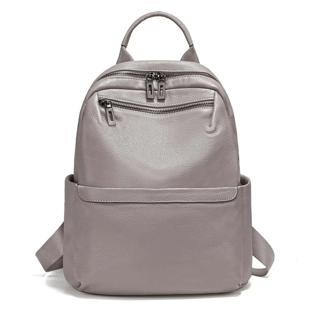 Pink leather backpack women, stylish and practical, lightweight and organized storage.