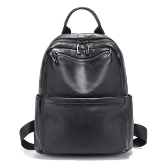 Black leather backpack designed for women, featuring organized storage and a sleek, minimalist style.