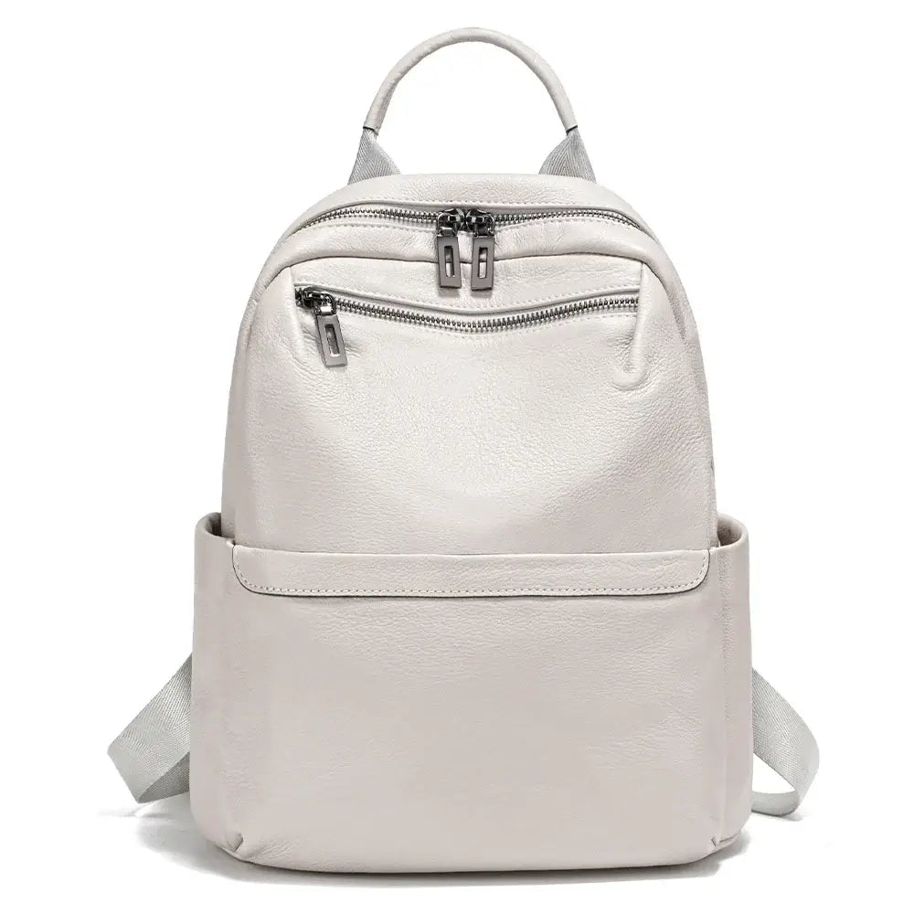 Pink leather backpack designed for women, lightweight and stylish, perfect for daily use.