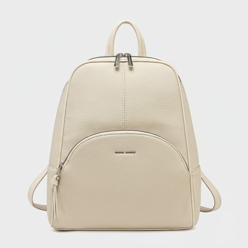 Fashion women's vintage style backpack in cream color with softback design and zipper closure.