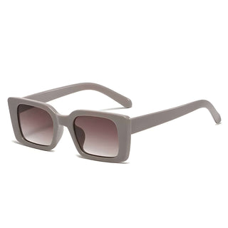 Women's gray square sunglasses with gradient lenses and UV400 protection for outdoor activities.