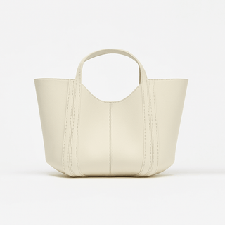 Soft PU leather beige handbag, casual tote bag with hasp closure for everyday wear.