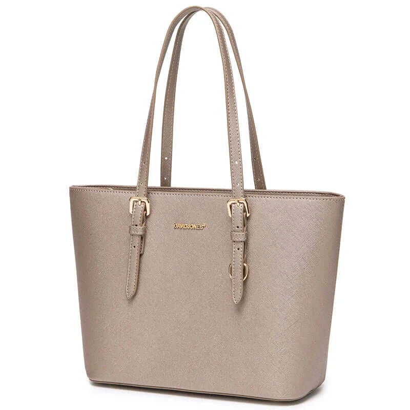 Women’s classic tote bag in beige faux leather with adjustable handles, versatile casual style, soft material.