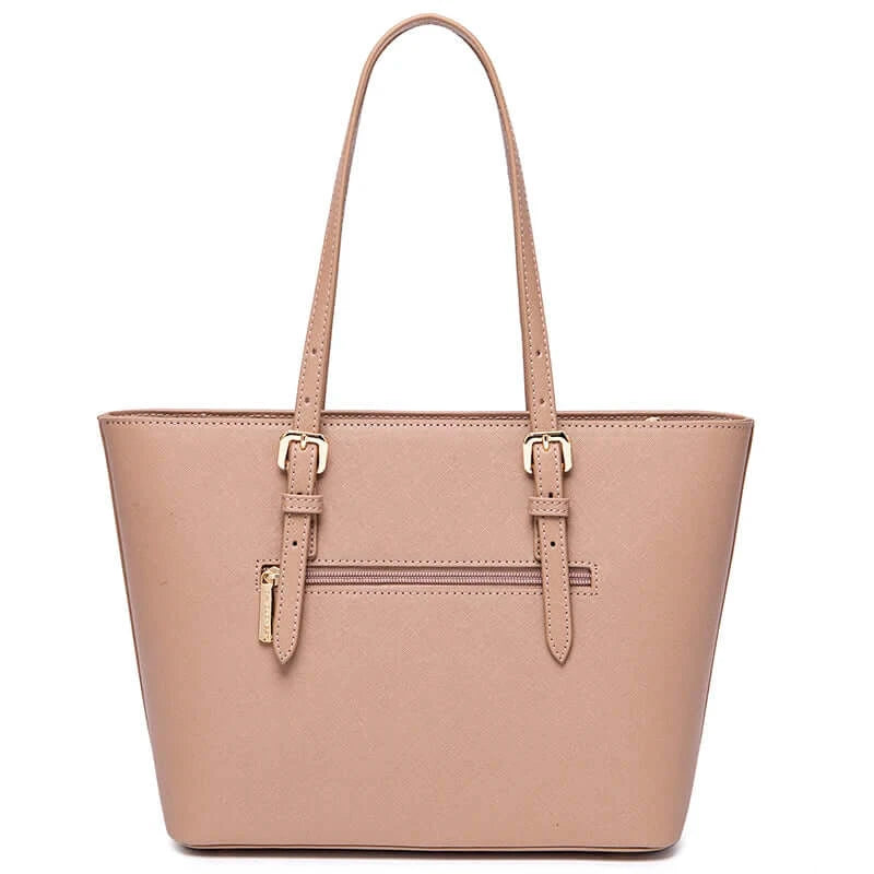 Women's tote bag in pink faux leather with adjustable handles, casual style and zipper closure for versatile use.