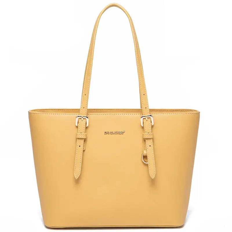 Women's Casual Tote Bag in Yellow Faux Leather with Adjustable Handles, Soft Zipper Closure and Interior Compartment.