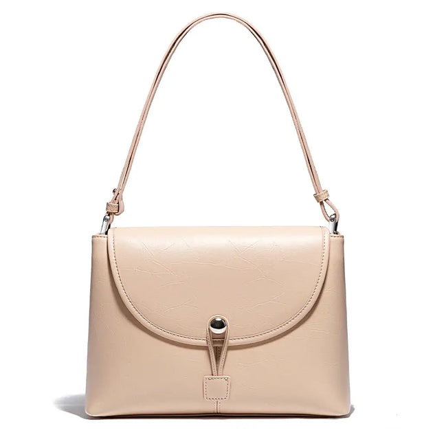 Leather crossbody bag in beige, handmade with 100% genuine leather, stylish and practical for everyday use.