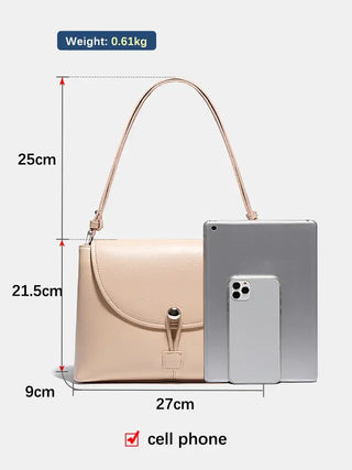 Leather crossbody bag in light beige, dimensions shown with cell phone and tablet for size reference.