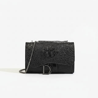 Black crossbody bag with chain, featuring stylish croc embossed design and flap closure, perfect for chic looks.