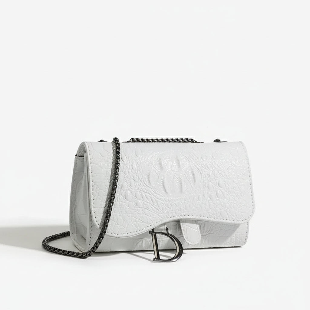 Crossbody Bag in white faux leather with chain detail, designed for elegance and style.