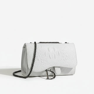 Crossbody Bag in white faux leather with chain detail, designed for elegance and style.