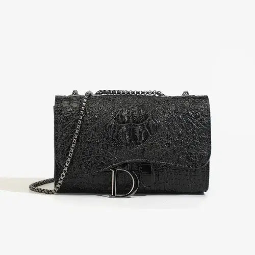 Black crossbody bag with chain, featuring a stylish crocodile texture, and metal logo embellishment.