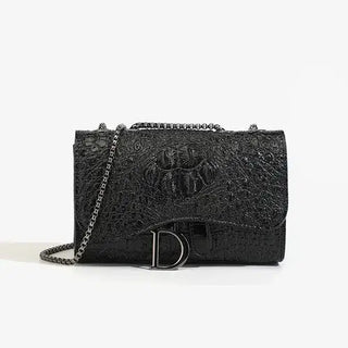 Black crossbody bag with chain, featuring a stylish crocodile texture, and metal logo embellishment.