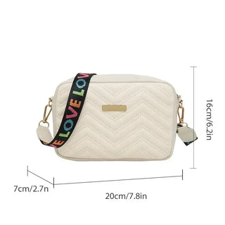 Beige quilted women’s crossbody bag with colorful strap, stylish PU leather satchel for everyday use.