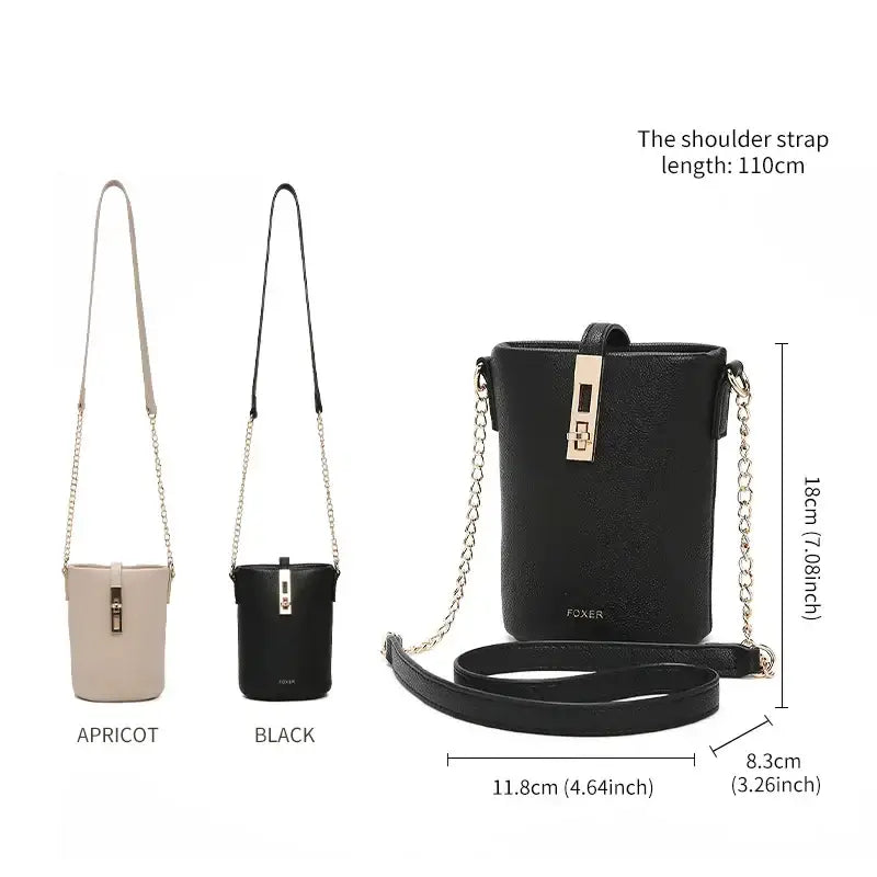 Black crossbody bag with gold chain strap, minimalist design, perfect for stylish women's fashion.