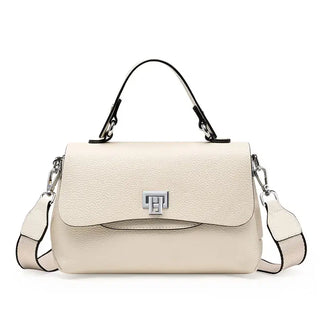 Timeless elegant white crossbody bag with silver lock detail and structured design, perfect for women's accessories.
