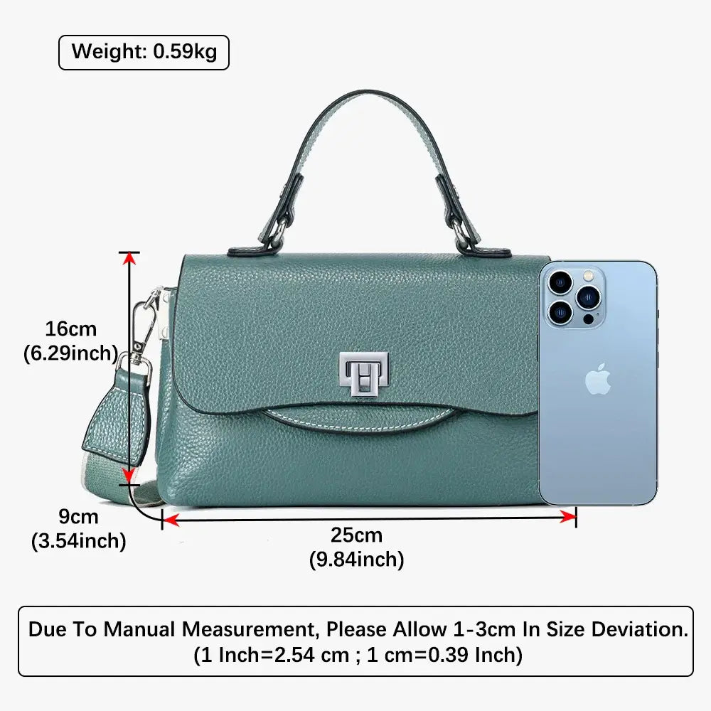 Crossbody bag in teal with measurements for size, featuring a sleek design and modern metallic accent.