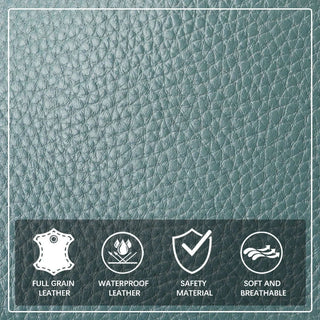 Close-up of full grain leather with waterproof feature and safety material icons, showcasing soft, breathable texture.