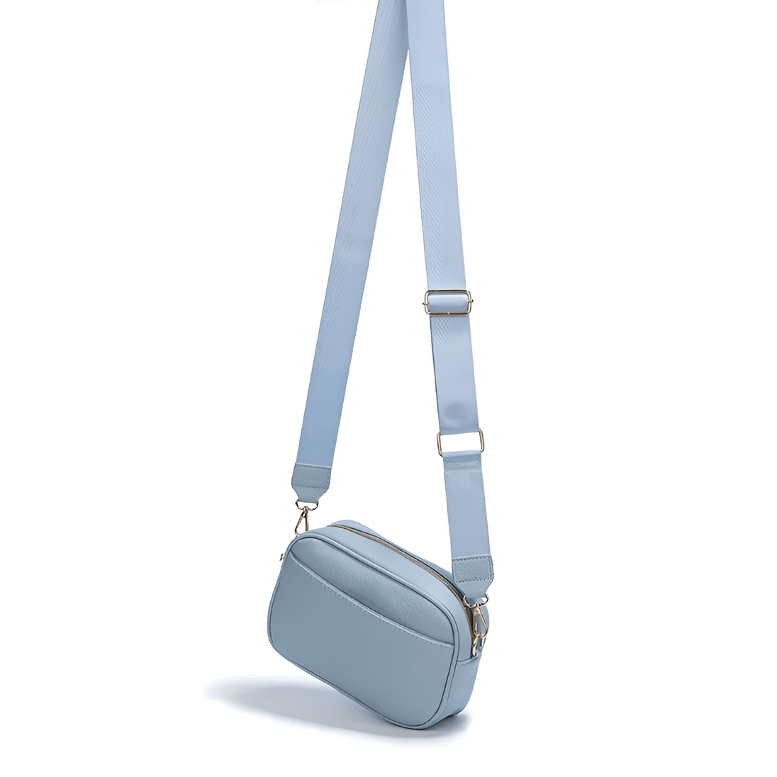 Crossbody bag with wide adjustable strap in light blue, made of durable PU leather for stylish everyday use.