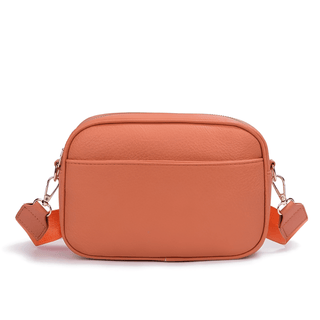 Crossbody bag with wide adjustable strap in stylish orange PU leather, perfect for everyday use.