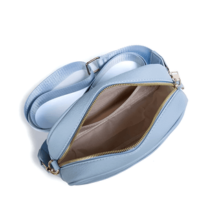 Crossbody bag with wide adjustable strap in light blue, featuring an open zipper and spacious interior.