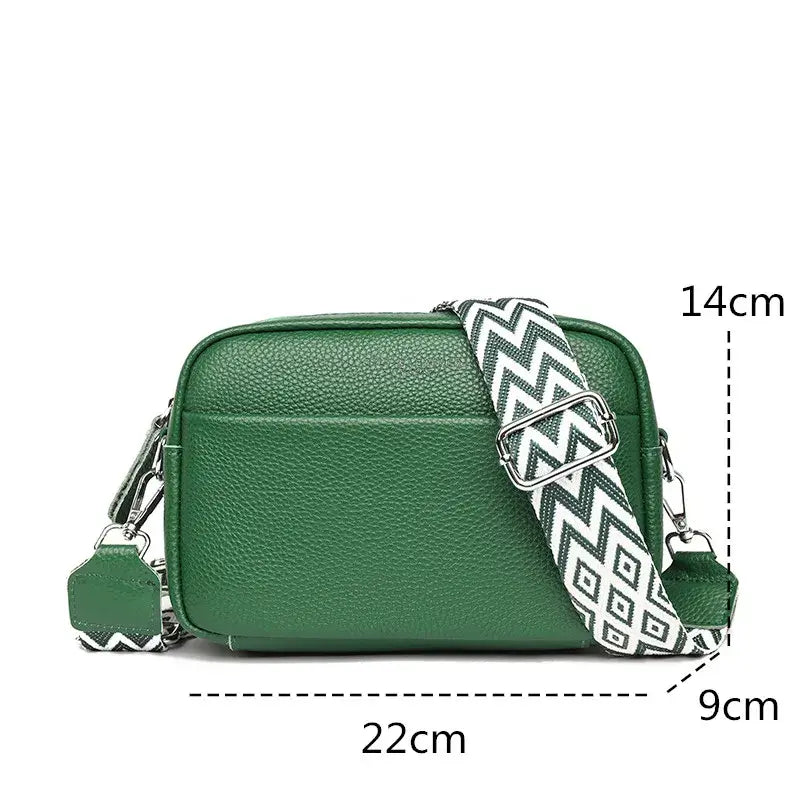 Green crossbody bag with adjustable strap, dimensions 22x9x14 cm, stylish and practical for everyday use.
