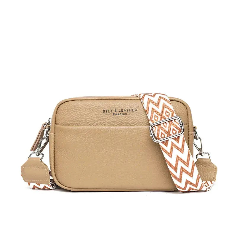Crossbody bag for women in beige with geometric strap, made of genuine leather, stylish and practical.