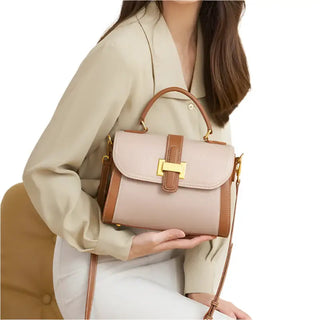 Women’s leather messenger bag in beige and brown, stylish and practical for daily use.