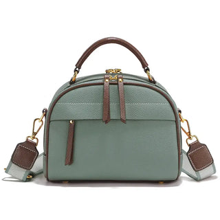 Light green leather satchel shoulder bag with brown accents and multiple compartments for everyday style.