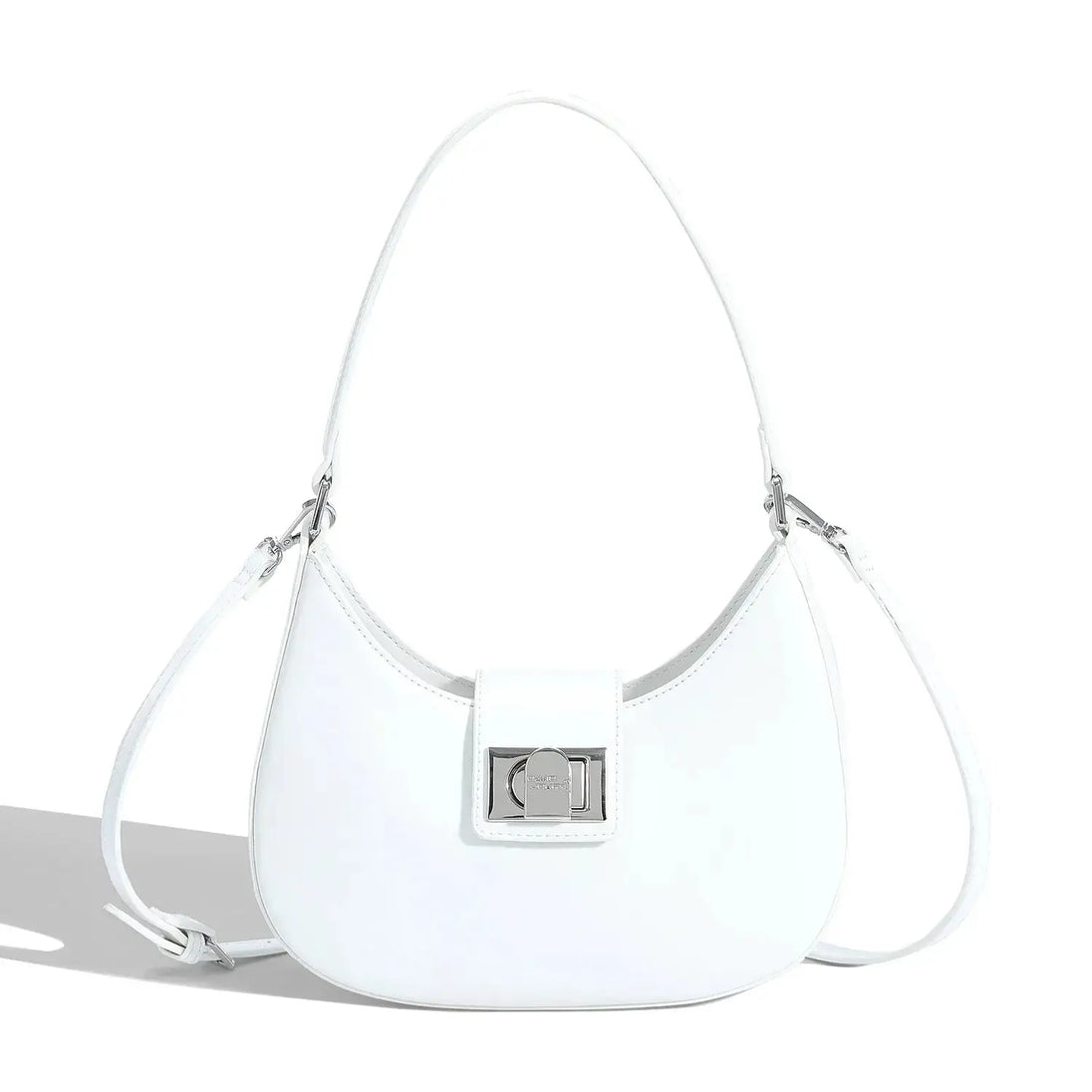 Women's shoulder bag in white faux leather with metal clasp, featuring a soft design and versatile style.