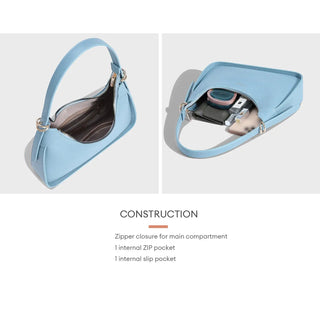 Women's Light Blue Faux Leather Half Moon Shoulder Bag showing zipper closure and internal pockets.
