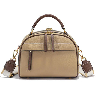 Structured beige leather shoulder bag with multi compartments and stylish rivet decoration.