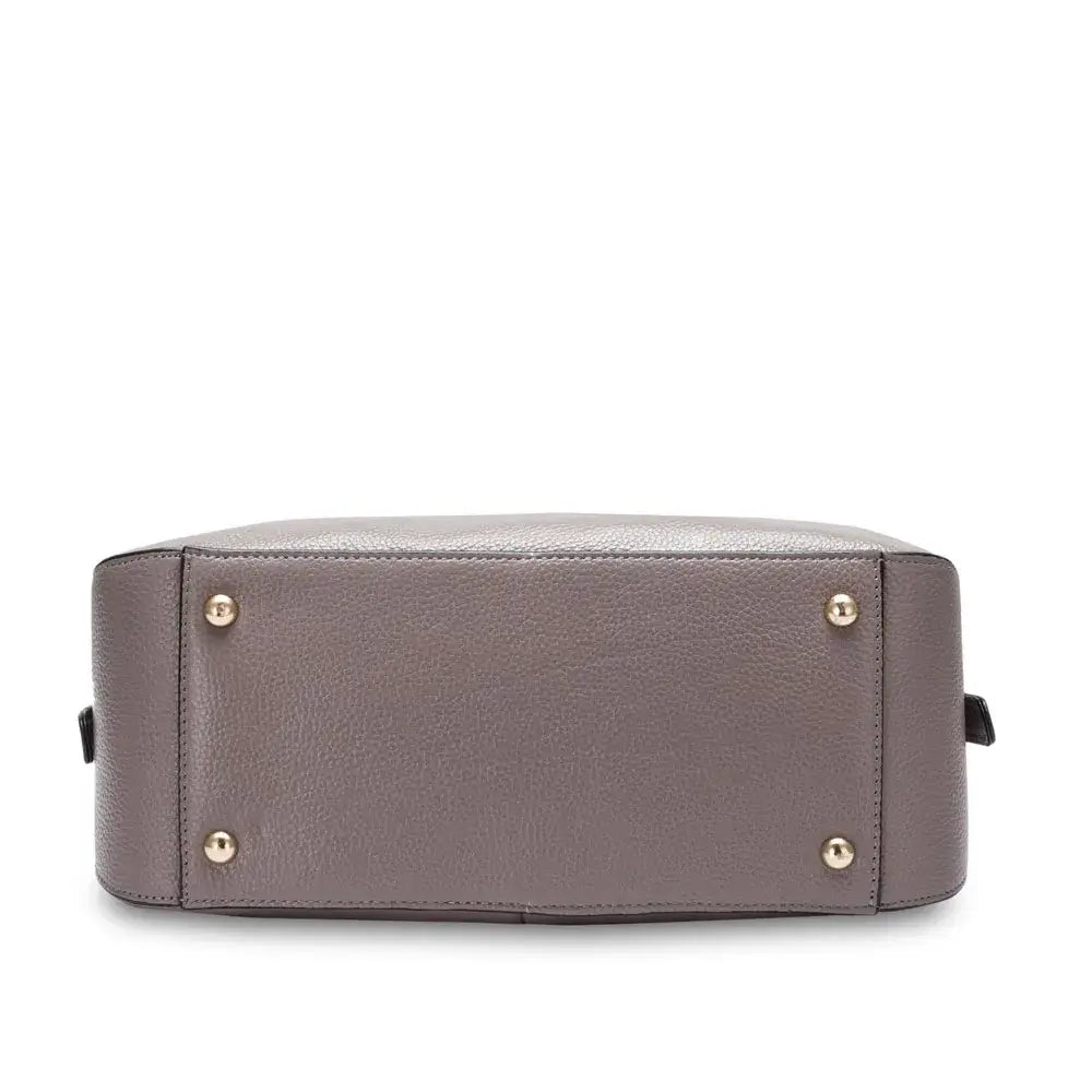 Leather shoulder bag in gray, showing base with gold feet for durability and style.