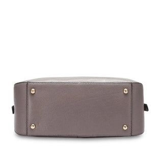 Leather shoulder bag in gray, showing base with gold feet for durability and style.