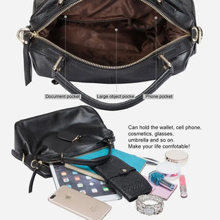 Shoulder bag black leather with spacious pockets for phone, wallet, and cosmetics, designed for convenience and style.