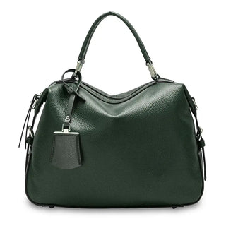 Leather shoulder bag in deep green with elegant design, perfect for versatile everyday use and sophisticated style.