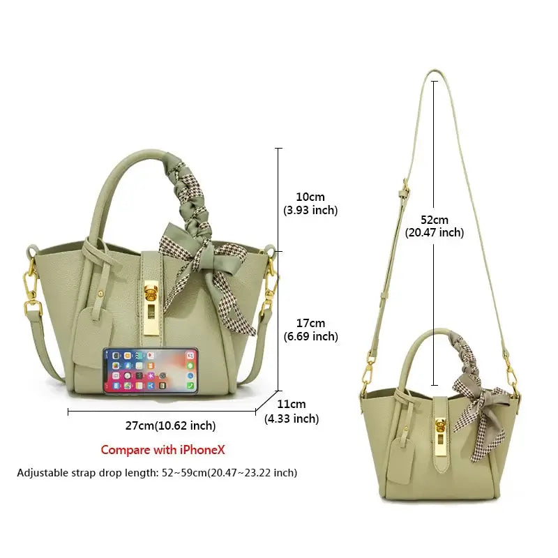 Light green leather women’s handbag with gold lock, scarf detail, and adjustable crossbody strap dimensions.